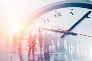 clock with people in the background